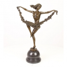 Een bronzen beeld/sculptuur van een bloemen danseres