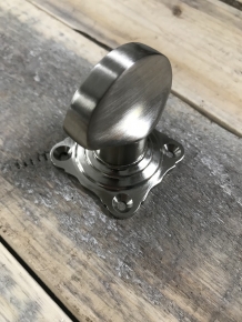 Nickel twist lock for toilet