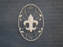 A large wrought iron wall ornament, the French Lily, antique-white