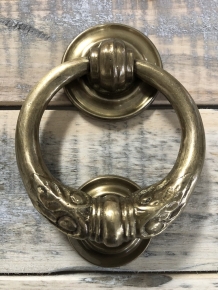 Door knocker, stylish and antique brass.