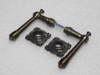 Montel Door Handle Set with Handle Rosettes - Dark Patinated Brass