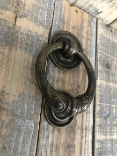 Door knocker, stylish and antique dark brass.