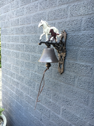 Doorbell horse with foal, cast iron