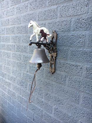 Doorbell horse with foal, cast iron