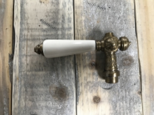 1 Door latch, patinated brass with white ceramic handle.