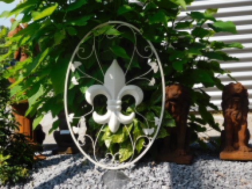 A large wrought iron wall ornament, the French Lily, antique-white