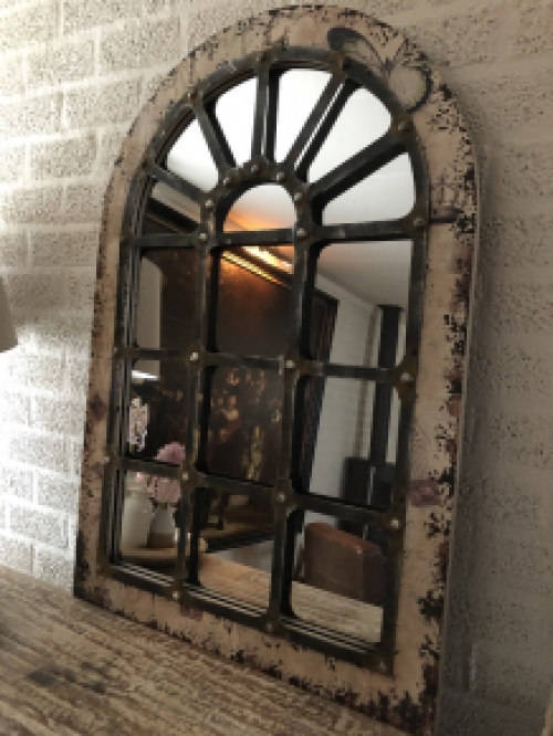 Large substantial stable window mirror, very nice in shape and robust in execution.