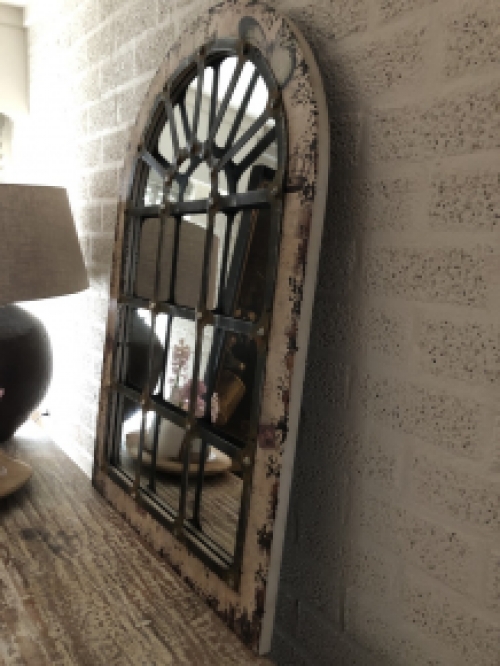 Large substantial stable window mirror, very nice in shape and robust in execution.