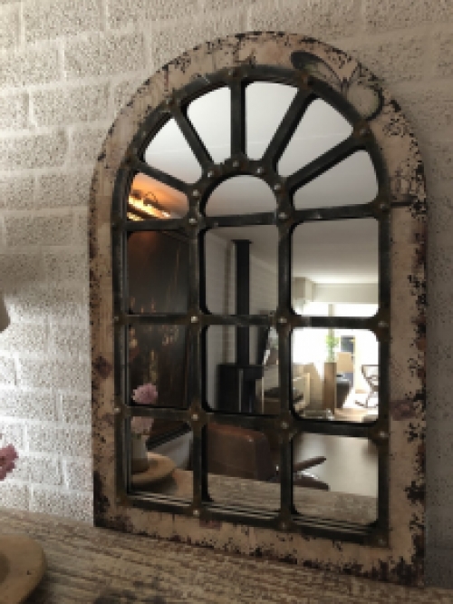 Large substantial stable window mirror, very nice in shape and robust in execution.