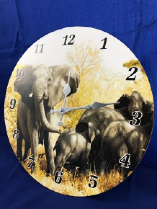 Clock with elephant images, beautiful.