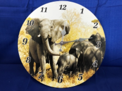 Clock with elephant images, beautiful.