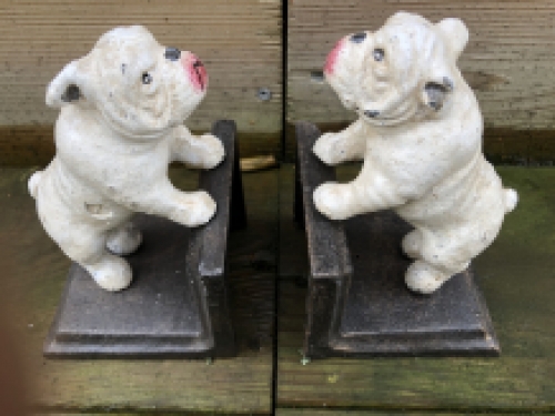 Cast iron bookend set with lacquered bull terrier dogs.