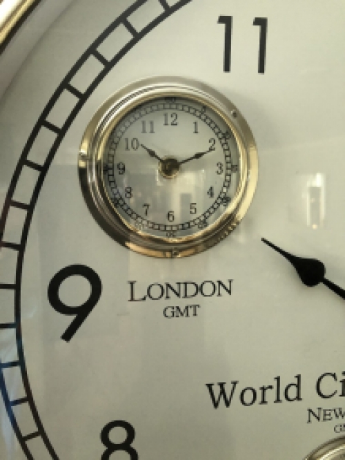 World time clock, chrome version with 4 movements, fantastic timepiece!!