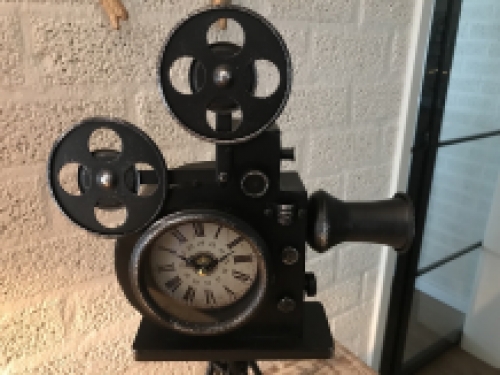 A nostalgic and decorative clock in the shape of an old film camera