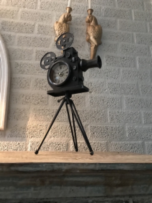 A nostalgic and decorative clock in the shape of an old film camera