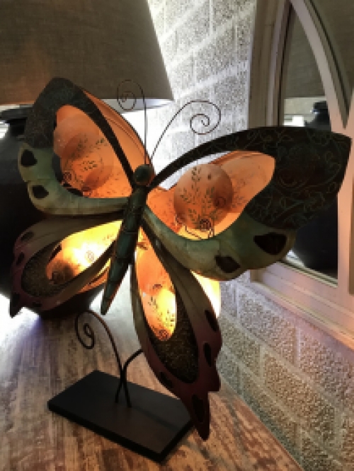 A metal lamp in the shape of a butterfly, very nice!