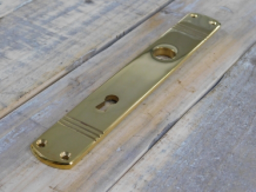 1 Long door plate, ''Laudi'' in polished brass, 1930s style, beautiful.