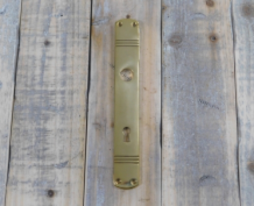 1 Lange deurplaat,  'Laudi' in messing gepolijst, jaren 30 stijl, fraai.