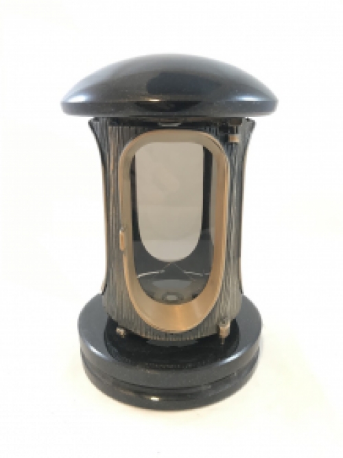 A lantern/grave lamp made entirely of granite with bronze fittings