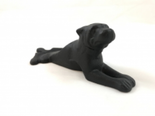 Door stopper in the shape of a dog, nice!