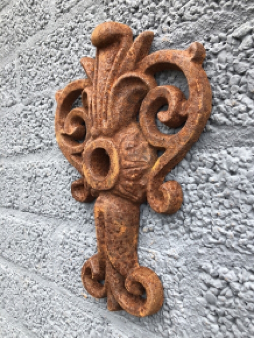 Wall anchor, cast iron, French lily shape.