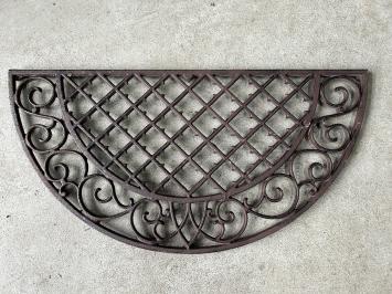 Cast iron doormat, half round.